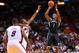 Oct 25, 2013; Miami, FL, USA; Brooklyn Nets shooting guard Joe Johnson (7) shoots over Miami Heat small forward James Jones (22) during their game at American Airlines Arena. Mandatory Credit: Steve Mitchell-USA TODAY Sports