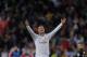 MADRID, SPAIN - APRIL 26: Cristiano Ronaldo of Real Madrid CF celebrates after scoring Real's 2nd goal from a free kick during the La Liga match between Real Madrid CF and CA Osasuna at the Santiago Bernabeu stadium on April 26, 2014 in Madrid, Spain. (Photo by Denis Doyle/Getty Images)
