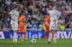 MADRID, SPAIN - MAY 04: Cristiano Ronaldo and Karim Benzema of Real Madrid FC react after Valencia CF scored their 2nd goal during the La Liga match between Real Madrid CF and Valencia CF at Santiago Bernabeu stadium on May 4, 2014 in Madrid, Spain. (Photo by Denis Doyle/Getty Images)