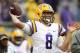 LSU quarterback Zach Mettenberger (8) warms up before an NCAA college football game against Texas A&M in Baton Rouge, La., Saturday, Nov. 23, 2013. (AP Photo/Gerald Herbert)