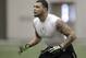 Texas A&M wide receiver Mike Evans works out during pro day for NFL football representatives in College Station, Texas, Thursday, March 27, 2014. (AP Photo/Patric Schneider)