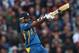 LONDON, ENGLAND - JUNE 13: Nuwan Kulasekara of Sri Lanka hits out during the ICC Champions Trophy Group A match between England and Sri Lanka at The Kia Oval on June 13, 2013 in London, England. (Photo by Paul Gilham/Getty Images)