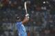 India's captain Mahendra Singh Dhoni plays a shot during their ICC Twenty20 Cricket World Cup match against Australia in Dhaka, Bangladesh, Sunday, March 30, 2014. (AP Photo/Aijaz Rahi)