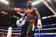 May 3, 2014; Las Vegas, NV, USA; Floyd Mayweather Jr. during a stoppage against Marcos Maidana at MGM Grand. Mandatory Credit: Mark J. Rebilas-USA TODAY Sports