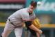 San Francisco Giants starting pitcher Matt Cain works against the Colorado Rockies in the first inning of a baseball game in Denver on Wednesday, April 23, 2014. (AP Photo/David Zalubowski)