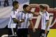 Argentina's Sergio Aguero, center, is congratulated by teammates Marcos Rojo, left, and Rodrigo Palacio after scoring during the second half of an international friendly soccer match against Bosnia Monday, Nov. 18, 2013, in St. Louis. Argentina won 2-0. (AP Photo/Jeff Roberson)