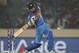India's batsman Rohit Sharma plays a shot during their ICC Twenty20 Cricket World Cup match against Bangladesh in Dhaka, Bangladesh, Friday, March 28, 2014. (AP Photo/Aijaz Rahi)