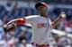 Cincinnati Reds closer Aroldis Chapman preserves the Reds' 4-1 victory while working in the ninth inning against the San Diego Padres in a baseball game in San Diego, Wednesday, July 31, 2013. (AP Photo/Lenny Ignelzi)