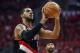 Apr 30, 2014; Houston, TX, USA; Portland Trail Blazers forward LaMarcus Aldridge (12) attempts a free throw during the second quarter against the Houston Rockets in game five of the first round of the 2014 NBA Playoffs at Toyota Center. Mandatory Credit: Troy Taormina-USA TODAY Sports