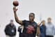 Louisville quarterback Teddy Bridgewater participates in a passing drill for NFL representatives during pro day at the University of Louisville in Louisville, Ky., Monday, March 17, 2014. (AP Photo/Timothy D. Easley)