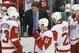 Detroit Red Wings head coach Mike Babcock talks with his team during a timeout in the third period against the Boston Bruins in Game 5 in the first round of the NHL hockey Stanley Cup playoffs in Boston, Saturday, April 26, 2014. Boston won 4-2 and eliminated the Red Wings from the playoffs. (AP Photo/Michael Dwyer)
