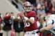 Alabama quarterback AJ McCarron (10) looks for a receiver during the first half of an NCAA college football game against Chattanooga in Tuscaloosa, Ala., Saturday, Nov. 23, 2013. (AP Photo/Dave Martin)