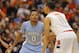North Carolina’s Nate Britt, left, guards Syracuse’s Tyler Ennis, right, in the second half of an NCAA college basketball game in Syracuse, N.Y., Saturday, Jan. 11, 2014. Syracuse won 57-45. (AP Photo/Nick Lisi)