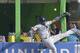 Los Angeles Dodgers right fielder Yasiel Puig is unable to catch a ball at the fence hit by Miami Marlins' Jeff Baker for a double, during the ninth inning of a baseball game, Sunday, May 4, 2014 in Miami. Adeiny Hechavarria scored on the play as the Marlins defeated the Dodgers 5-4. (AP Photo/Wilfredo Lee)