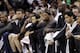Brooklyn Nets' Paul Pierce, third from right, and Kevin Garnett, second from right, watch from the bench in the second half of Game 1 in an NBA basketball Eastern Conference semifinal playoff series against the Miami Heat, Tuesday, May 6, 2014, in Miami. The Heat defeated the Nets 107-86. (AP Photo/Lynne Sladky)