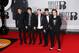 British band One Direction, from left, Liam Payne, Harry Styles, Niall Horan, Zayn Malik, and Louis Tomlinson arrive at the BRIT Awards 2014 at the O2 Arena in London on Wednesday, Feb. 19, 2014. (Photo by Joel Ryan/Invision/AP)