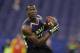 USC wide receiver Marqise Lee makes a catch during a drill at the NFL football scouting combine in Indianapolis, Sunday, Feb. 23, 2014. (AP Photo/Michael Conroy)
