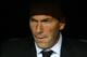 MADRID, SPAIN - APRIL 02: Real Madrid's assistant manager Zinedine Zidane looks on prior to the UEFA Champions League Quarter Final first leg match between Real Madrid and Borussia Dortmund at Estadio Santiago Bernabeu on April 2, 2014 in Madrid, Spain. (Photo by Clive Rose/Getty Images)