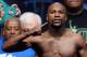 LAS VEGAS, NV - MAY 02: WBC welterweight champion Floyd Mayweather Jr. poses on the scale during his official weigh-in at the MGM Grand Garden Arena on May 2, 2014 in Las Vegas, Nevada. Mayweather will meet WBA champion Marcos Maidana in a WBC/WBA unification fight in Las Vegas on May 3. (Photo by Ethan Miller/Getty Images)