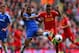 LIVERPOOL, ENGLAND - APRIL 27: Ashley Cole of Chelsea and Raheem Sterling of Liverpool battle for the ball during the Barclays Premier League match between Liverpool and Chelsea at Anfield on April 27, 2014 in Liverpool, England. (Photo by Clive Brunskill/Getty Images)