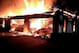 In this photo provided by the Hillsborough County Sheriff's Office, flames destroy a mansion owned by former tennis star James Blake Wednesday May 7, 2014, in a gated community in Tampa, Fla. Officials have confirmed that three bodies have been found in the home. Hillsborough County Sheriff's Spokeswoman Cristal Bermudez Nunez says neighbors have told detectives that Blake hasn't lived in the house for a while and was renting it out. (AP Photo/Hillsborough County Sheriff's Office)
