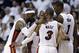 Miami Heat's LeBron James, left, Dwyane Wade (3), Chris Bosh (1) and Ray Allen, center, huddle on the court in the second half of Game 1 in an NBA basketball Eastern Conference semifinal playoff series against the Brooklyn Nets, Tuesday, May 6, 2014, in Miami. The Heat defeated the Nets 107-86. (AP Photo/Lynne Sladky)