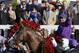 Victor Espinoza celebrates after riding California Chrome to victory in the 140th running of the Kentucky Derby horse race at Churchill Downs Saturday, May 3, 2014, in Louisville, Ky. (AP Photo/David Goldman)