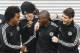 CORRECTS PLAYERS NAME TO OSCAR - Chelsea's players Willian, left, David Luiz, second left, Ramires, second right, and Oscar, right, arrive for a training session at Cobham in England Tuesday, April 29, 2014. Chelsea will play in a Champions League semifinal second leg soccer match against Atletico Madrid on Wednesday. (AP Photo/Kirsty Wigglesworth)