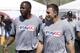 Louisville's Teddy Bridgewater, left, and Texas A&M's Johnny Manziel participate in an NFL football event in New York, Wednesday, May 7, 2014. The event was to promote Play 60, an NFL program which encourages kids to be active for a healthy life. (AP Photo/Seth Wenig)