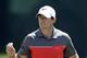 Rory McIlroy, of Northern Ireland, waves to the crowd after making par on the 16th hole during the third round of the Wells Fargo Championship golf tournament in Charlotte, N.C., Saturday, May 3, 2014. (AP Photo/Chuck Burton)