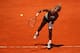 MADRID, SPAIN - MAY 08: Serena Williams of the United States serves against Carla Suarez Navarro of Spain in their third round match during day six of the Mutua Madrid Open tennis tournament at the Caja Magica on May 8, 2014 in Madrid, Spain. (Photo by Clive Brunskill/Getty Images)