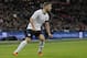 England's Luke Shaw plays against Denmark during their international friendly soccer match at Wembley Stadium in London, Wednesday, March 5, 2014. (AP Photo/Sang Tan)