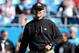 CHARLOTTE, NC - JANUARY 12: Head coach Jim Harbaugh of the San Francisco 49ers walks on the field prior to the NFC Divisional Playoff Game against the Carolina Panthers at Bank of America Stadium on January 12, 2014 in Charlotte, North Carolina. (Photo by Grant Halverson/Getty Images)