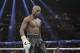 Floyd Mayweather Jr. stands in the ring during his WBC-WBA welterweight title boxing fight against Marcos Maidana Saturday, May 3, 2014, in Las Vegas. (AP Photo/Isaac Brekken)