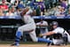 New York Mets' Chris Young, left, strikes out swinging at a pitch as Colorado Rockies catcher Micahel McKenry fields the ball in the ninth inning of the Mets' 5-1 victory in a baseball game in Denver on Sunday, May 4, 2014. (AP Photo/David Zalubowski)