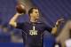 Central Florida quarterback Blake Bortles throws during a drill at the NFL football scouting combine in Indianapolis, Sunday, Feb. 23, 2014. (AP Photo/Michael Conroy)