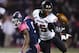 Northern Illinois safety Jimmie Ward (15) intercepts a pass intended for Toledo wide receiver Alonzo Russell (9) in the first quarter an NCAA college football game in Toledo, Ohio, Wednesday, Nov. 20, 2013. (AP Photo/Rick Osentoski)