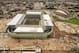 FILE - This Jan. 10, 2014 file photo, released by Portal da Copa, shows an aerial view of the Arena Pantanal in Cuiaba, Brazil. A worker at the World Cup stadium died Thursday, May 8, 2014 in an electrical accident, temporarily interrupting construction at Arena Pantanal, one of the most-delayed venues before the soccer tournament. (AP Photo/Portal da Copa, Jose Medeiros, File)