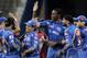 Mumbai Indians’ Kieron Pollard, center right, Sachin Tendulkar, center left, and Harbhajan Singh, second right, celebrate the dismissal of Kolkata Knight Riders’ Gautam Gambhir during an Indian Premier League (IPL) cricket match in Mumbai, India, Wednesday, May 16, 2012. (AP Photo/Rajanish Kakade)