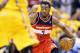 INDIANAPOLIS, IN - MAY 05: John Wall #2 of the Washington Wizards dribbles the ball against the Indiana Pacers in Game 1 of the Eastern Conference Semifinals during the 2014 NBA Playoffs at Bankers Life Fieldhouse on May 5, 2014 in Indianapolis, Indiana. NOTE TO USER: User expressly acknowledges and agrees that, by downloading and or using this photograph, User is consenting to the terms and conditions of the Getty Images License Agreement. (Photo by Andy Lyons/Getty Images)