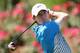 PONTE VEDRA BEACH, FL - MAY 08: Rory McIlroy of Northern Ireland watches his tee shot on the 18th hole during the first round of THE PLAYERS Championship on The Stadium Course at TPC Sawgrass on May 8, 2014 in Ponte Vedra Beach, Florida. (Photo by Richard Heathcote/Getty Images)