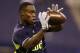 Oregon State wide receiver Brandin Cooks makes a catch as he runs a drill at the NFL football scouting combine in Indianapolis, Sunday, Feb. 23, 2014. (AP Photo/Michael Conroy)