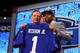 NEW YORK, NY - MAY 08: Odell Beckham Jr of the LSU Tigers poses with NFL Commissioner Roger Goodell after he was picked #12 overall by the New York Giants during the first round of the 2014 NFL Draft at Radio City Music Hall on May 8, 2014 in New York City. (Photo by Elsa/Getty Images)
