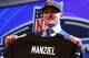 NEW YORK, NY - MAY 08: Johnny Manziel of the Texas A&M Aggies poses with a jersey after he was picked #22 overall by the Cleveland Browns during the first round of the 2014 NFL Draft at Radio City Music Hall on May 8, 2014 in New York City. (Photo by Elsa/Getty Images)