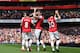 LONDON, ENGLAND - MAY 04: Olivier Giroud (C) of Arsenal celebrates with team mates after scoring during the Barclays Premier League match between Arsenal and West Bromwich Albion at the Emirates Stadium on May 4, 2014 in London, England. (Photo by Shaun Botterill/Getty Images)