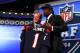 NEW YORK, NY - MAY 08: Jadeveon Clowney of the South Carolina Gamecocks stands on stage with NFL Commissioner Roger Goodell after he was picked #1 overall by the Houston Texansduring the first round of the 2014 NFL Draft at Radio City Music Hall on May 8, 2014 in New York City. (Photo by Elsa/Getty Images)