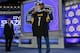 Ohio State outside linebacker Ryan Shazier poses for photos after being selected by the Pittsburgh Steelers as the 15th pick in the first round of the 2014 NFL Draft, Thursday, May 8, 2014, in New York. (AP Photo/Craig Ruttle)