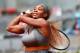 MADRID, SPAIN - MAY 07: Serena Williams of USA in action against Shuai Peng of China during day five of the Mutua Madrid Open tennis tournament at the Caja Magica on May 7, 2014 in Madrid, Spain. (Photo by Julian Finney/Getty Images)