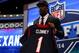 NEW YORK, NY - MAY 08: Jadeveon Clowney of the South Carolina Gamecocks poses with a jersey after he was picked #1 overall by the Houston Texansduring the first round of the 2014 NFL Draft at Radio City Music Hall on May 8, 2014 in New York City. (Photo by Elsa/Getty Images)
