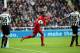 Liverpool's Daniel Sturridge, center, celebrates his goal during their English Premier League soccer match against Newcastle United at St James' Park, Newcastle, England, Saturday, Oct. 19, 2013. (AP Photo/Scott Heppell)